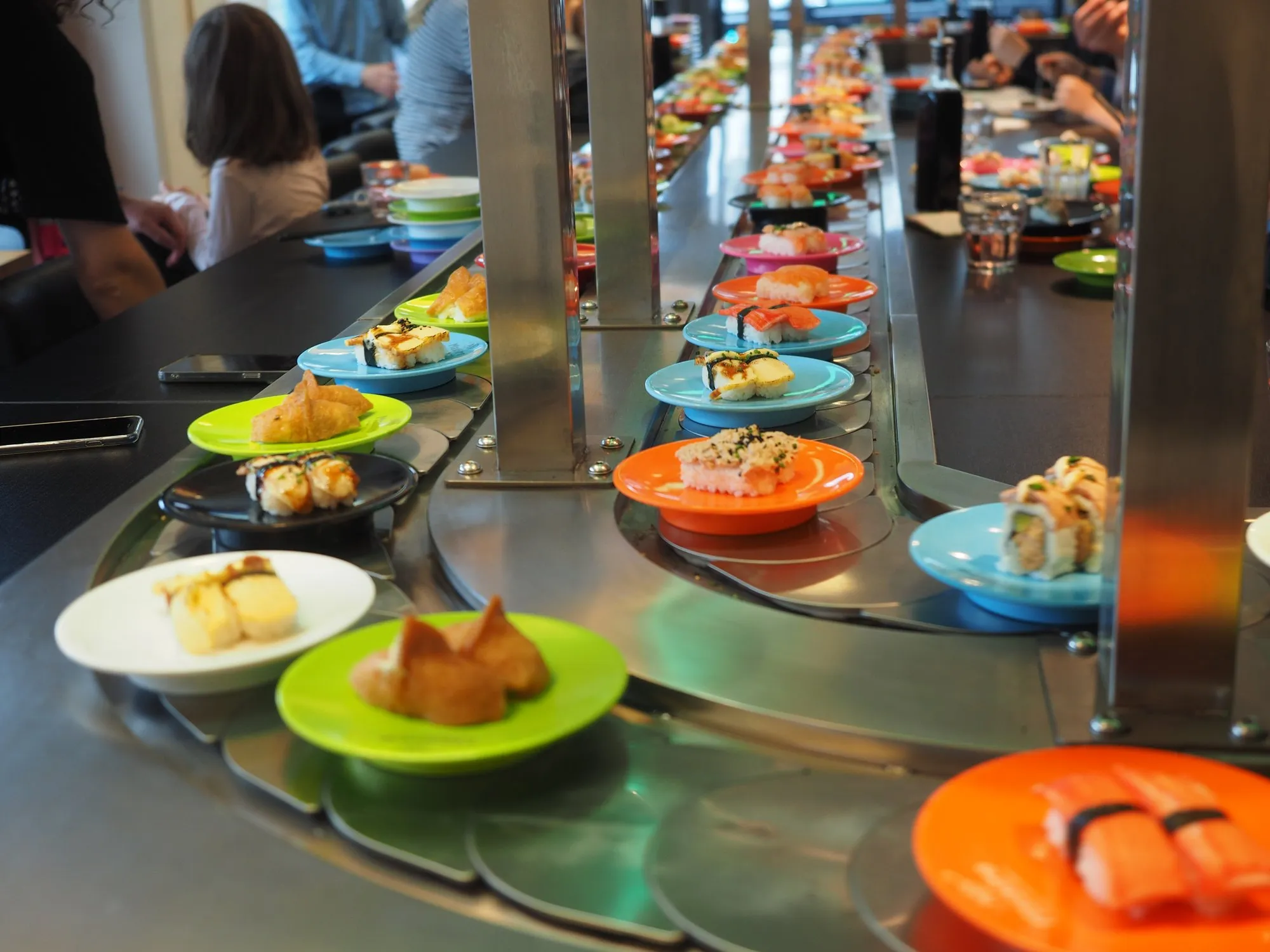 Plates of sushi on a conveyor belt